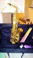Alto Saxophon mit Koffer + Notenständer mit Tasche