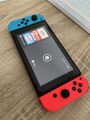 Nintendo Switch Konsole mit Joy-Con - Neon-Rot/Neon-Blau/Grau