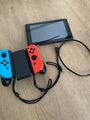 Nintendo Switch Konsole mit Joy-Con - Neon-Rot/Neon-Blau/Grau