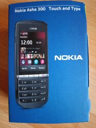 Nokia Asha 300, funktionsfähig mit starken Gebrauchsspuren, für Bastler geeignet