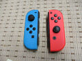 Original Nintendo Switch Joy-Con 2er Set Controller Blau Links & Neonrot Rechts