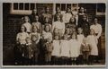 Sozialgeschichte echte Fotogruppe von Kindern mit Lehrer Vintage Postkarte