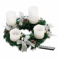 Britesta Adventsgesteck: Adventskranz mit weißen LED-Kerzen, silbern geschmückt
