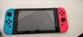 Nintendo Switch Konsole mit Joy-Con -Neon-Rot/Neon-Blau/Grau 2X Controller dabei