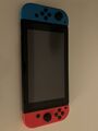 Nintendo Switch Konsole mit Joy-Con - Neon-Rot/Neon-Blau/Grau