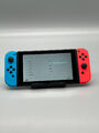 Nintendo Switch Konsole  mit Joy-Con - Neon-Rot/Neon-Blau/Grau / Refurbished