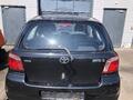 Toyota Yaris P1 orig Heckklappe mit Scheibe 209 Mysticschwarz mica Bj 00