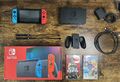 Nintendo Switch Konsole OVP Neon-Rot/Neon-Blau/Grau + 2 Spiele