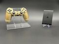 Sony Playstation TV mit einem goldenen Sony Playstation 4 V2 Controller