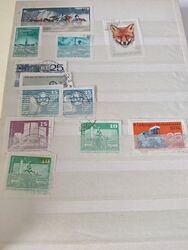 1 Seite aus dem Album mit 20 Briefmarken, Ungarn, DDR, Österreich