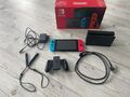 Nintendo Switch Konsole mit Joy-Con - Neon-Rot/Neon-Blau/Grau 