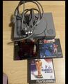 playstation 1 -+ 2 Controller + Memory Card + 4fach Adapter +spiele