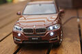 BMW X5 F15 1:24 MIT LED-BELEUCHTUNG(XENON) WELLY PYRITBRAUN BRAUN 