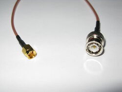 Adapter Kabel Pigtail BNC Stecker auf SMA Stecker gerade 50cm RG316