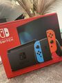 Nintendo Switch Konsole mit Joy-Con - Neon-Rot/Neon-Blau/Grau