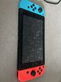 Nintendo Switch 2022 Edition 32GB Spielkonsole - Neon-Rot/Neon-Blau + Minecraft