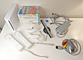 Nintendo Wii Konsolenpaket mit 9 Spielen + 2 Fernbedienungen - vollständig getestet und funktionsfähig