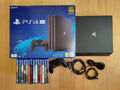 Sony PlayStation 4 Pro 1 TB Spielkonsole + 14 Spiele