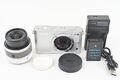 Nikon 1 J1 10,1 MP spiegellose Kamera Silber mit VR 10–30 mm Objektiv,...