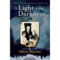 A Light in the Darkness - Albert Marrin, Kartoniert (TB)